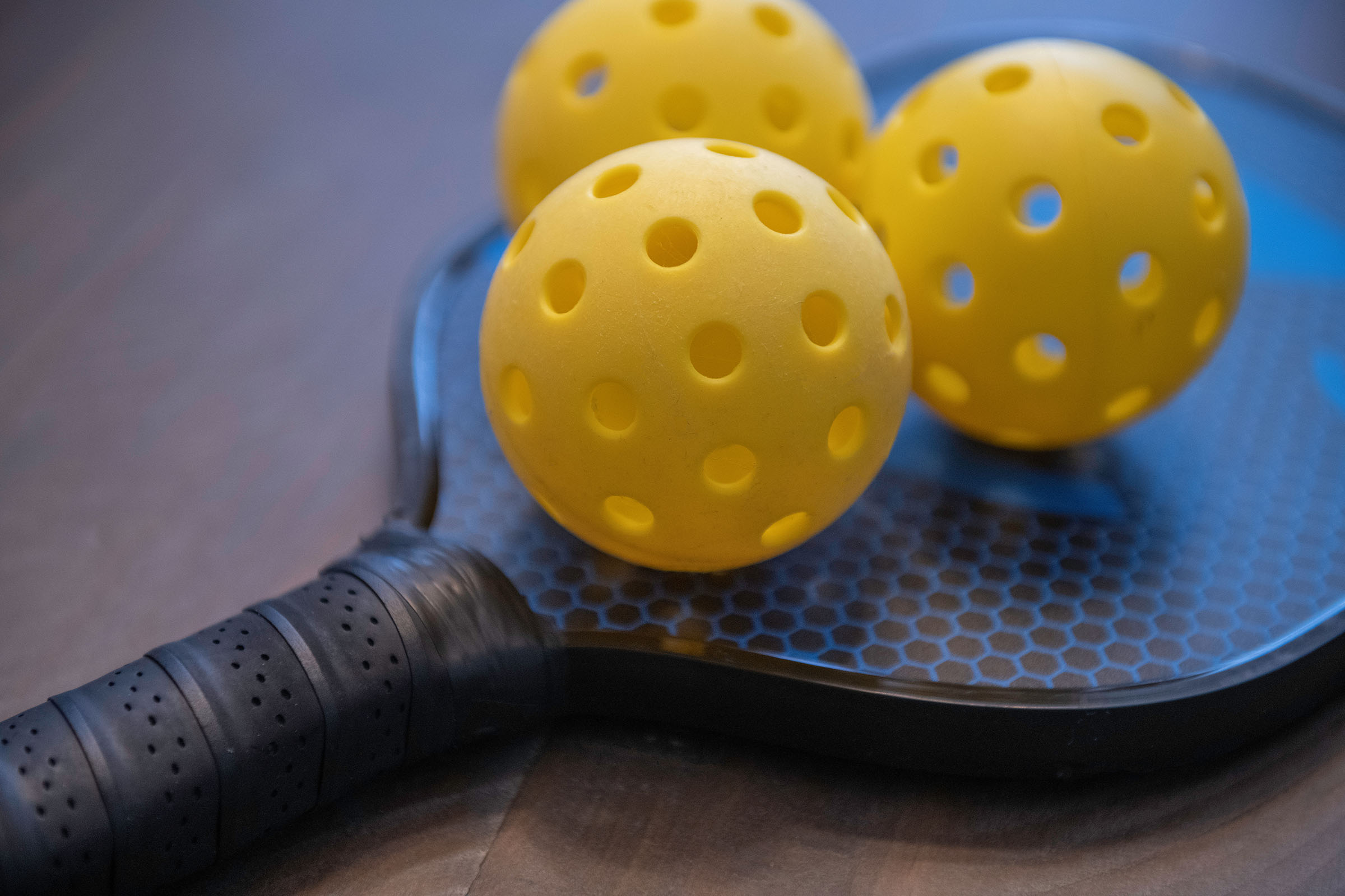 Players enjoying indoor pickleball at The Pickleball Spot in Houston